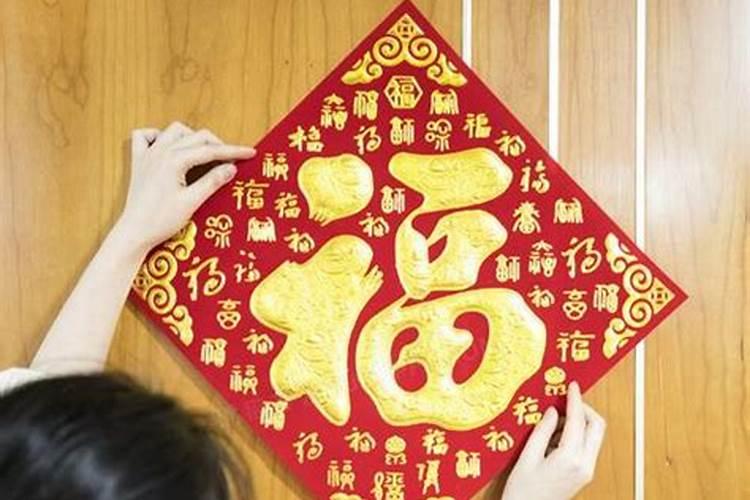 在进户门上贴“天官赐福”,就能化解门对门的邪吗？
