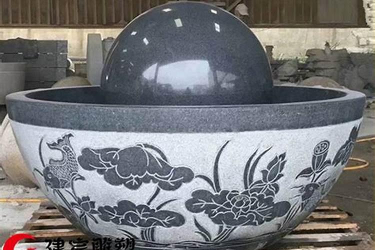 墓地石狮子能嘴里含风水球吗？