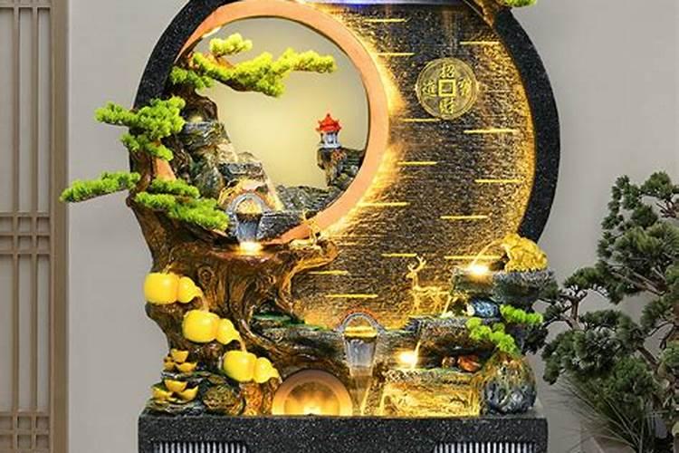 进门对面墙装假山高山流水落地喷泉对风水有影响吗？